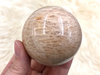 Peach Moonstone Sphere 56mm JV - Heart Chakra & Solar Plexus Chakra