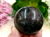 Garnet in Arfvedsonite 44 mm Sphere WN - Throat & Root Chakra Stone