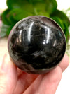 Garnet in Arfvedsonite 43 mmSphere WJ - Throat & Root Chakra Stone