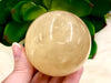 Honey Calcite Sphere 60mm QQ - Solar Plexus Chakra Stone