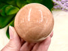 Peach Moonstone Sphere 53mm QT - Heart Chakra & Solar Plexus Chakra