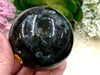 Nuummite 63mm Sphere WI - Third Eye Chakra Stone