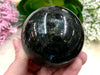 Nuummite 63mm Sphere WI - Third Eye Chakra Stone