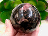 Rhodonite Sphere 58mm QM - Heart Chakra Crystal