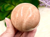 Peach Moonstone Sphere 53mm QT - Heart Chakra & Solar Plexus Chakra