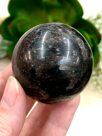 Garnet in Arfvedsonite 44 mm Sphere WN - Throat & Root Chakra Stone